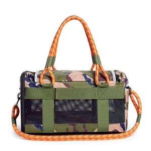 Green and Orange Dog Travel Carrier with Rugged Design